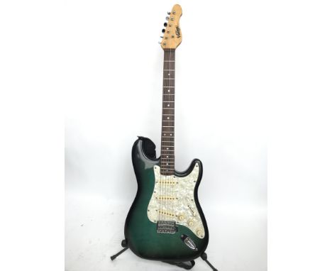 A Vintage Stratocaster style electric guitar with a green burst finish and white pearloid scratchplate. Comes supplied with a