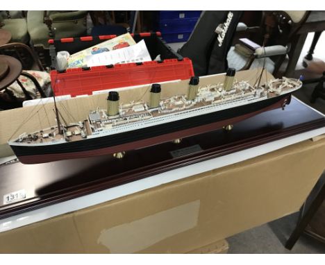 A model of the RMS Titanic by the Danbury Mint. 81cm. With box.