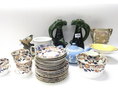 A pair of unusual shaped glazed pottery candle holders, a decorative tea set (five cups) and other ceramics (a lot)