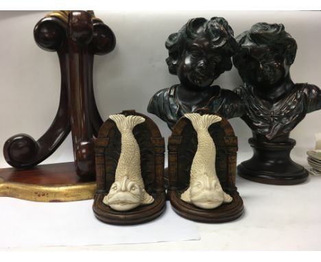 A pair of Antique style bookends together with a pair of reproduction busts And a bracket.