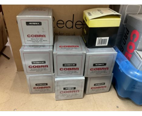2 boxes of boxed Cobra camera accessories including lenses.