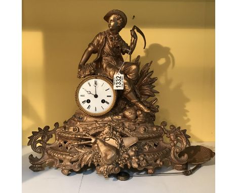 A Victorian gilt mantle clock with Roman numerals surmounted with a farmer and other ornate decoration. A/f as pictured. Appr