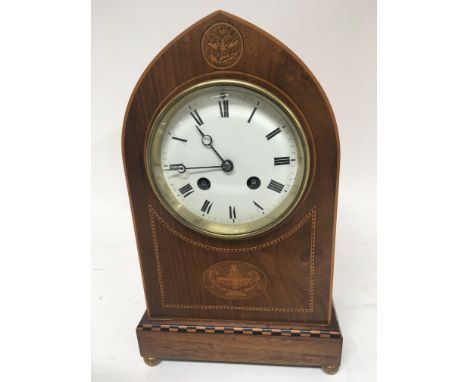 A Quality Edwardian inlaid Walnut mantel clock with an enamel dial key wind brass movement striking on a gong.