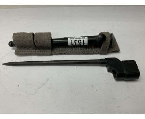 A WW2 military issue spike bayonet with scabbard and frog.