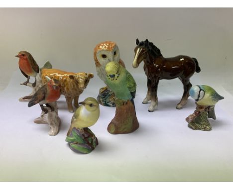 A small collection of animals including Beswick, Staffordshire, Worcester etc.