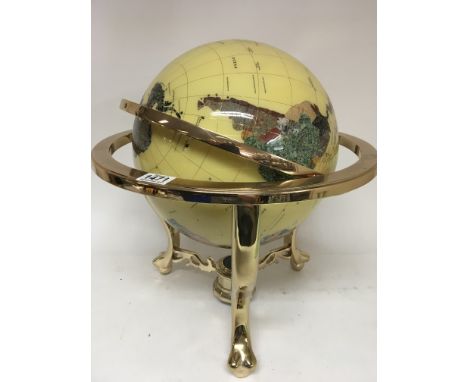 A large Specimen Globe on a brass stand.