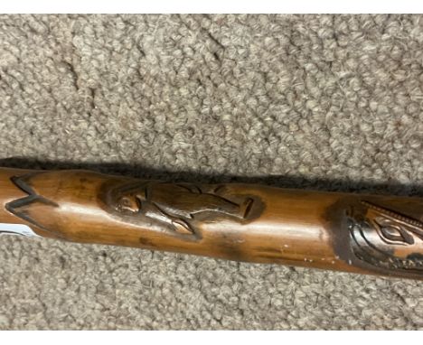 A carved Chinese bamboo waking stick.