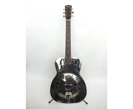 A Vintage Resonator guitar and hard shell carry case.
