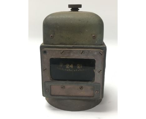 A vintage binnacle compass in working order.