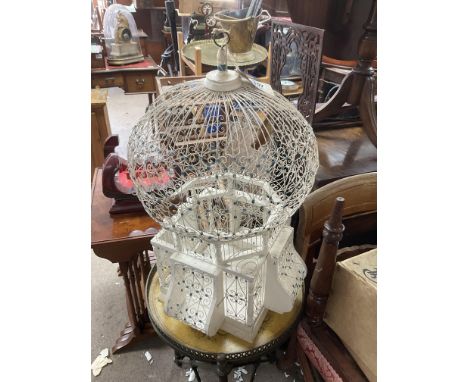 A vintage painted birdcage