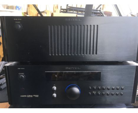 A Rotel five channel power amplifier RMB 1575 together with a Rotel surround sound processor RSP 1570 (2).