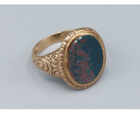 A 9ct gold stone set Signet ring of oval form, 8.6gms, ring size S