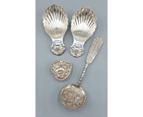 A pair of Birmingham silver Caddy spoons with scallop form bowls together with a Chinese silver spoon, maker Daik Hing and a 