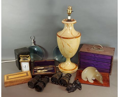 A toleware table lamp together with a collection of bottles, two pairs of field glasses, a brass carriage clock and a collect