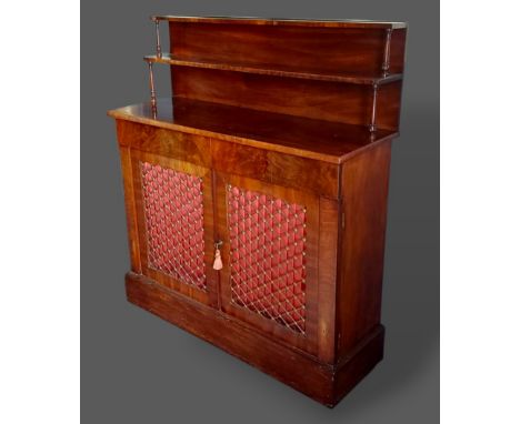 A 19th Century mahogany Chiffonier with a shelf back above two concealed drawers above two brass grille and fabric pleated do