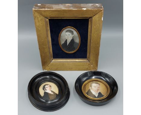 A 19th Century oval portrait miniature together with another similar circular portrait miniature and another in gilded frame 