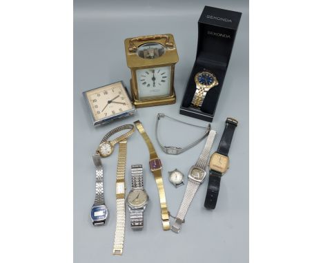 A Sekonda wristwatch together with a collection of other wristwatches, a brass cased Carriage clock and a Smiths travelling c