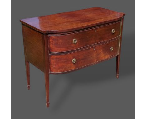 A 19th Century mahogany commode with two drawers with brass handles raised upon square tapering legs with spade feet, 111cms 