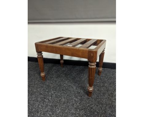 19th century luggage stand, the slatted top raised on fluted legs[45x61x46cm] 