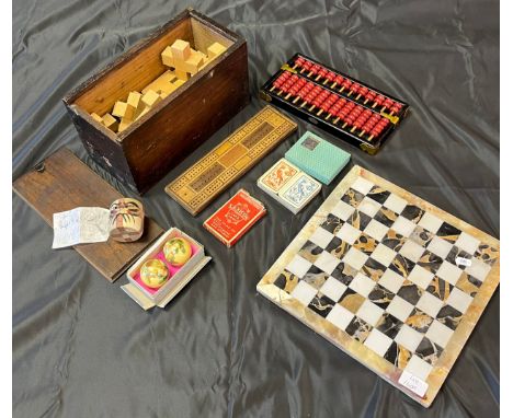 A Lot of vintage game collectables to include box of building blocks, Marker, cards and marble/ onyx chessboard. 