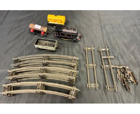 A Vintage Hornby Type 40 clockwork train, and three wagons, together with original track. 