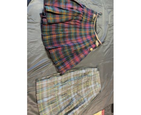 A Vintage gent's and ladies kilt and skirt.