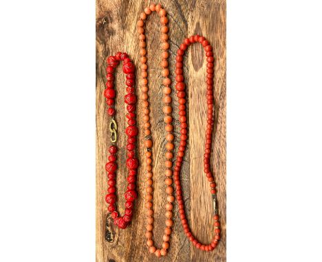 Two Vintage coral necklaces with gold clasps. Together with a unusual Art Deco red glass necklace. [Coral 42.48grams] 