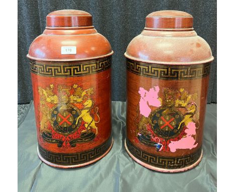Two vintage tin painted and transfer storage pots with lids. [46cm in height] 