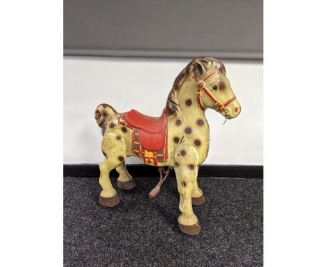 A Vintage child's tin plate Mobo rocking horse