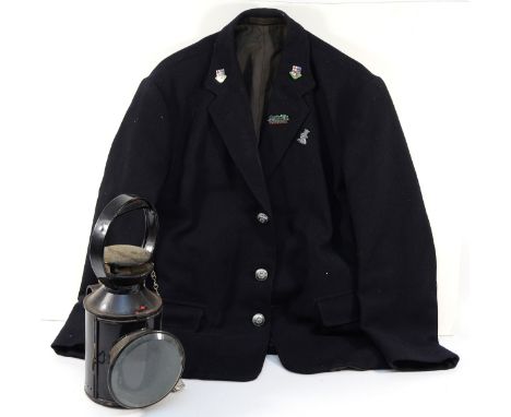 A painted black three aspect railway lamp, together with a 'Thunderer' Acme whistle stamped L.N.E.R and a railway workers jac