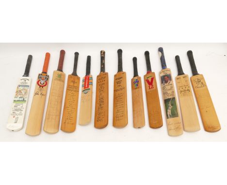 A collection of twelve facsimile and signed miniature cricket bats to include; Sir Gary Sobers career record signed in pen; S