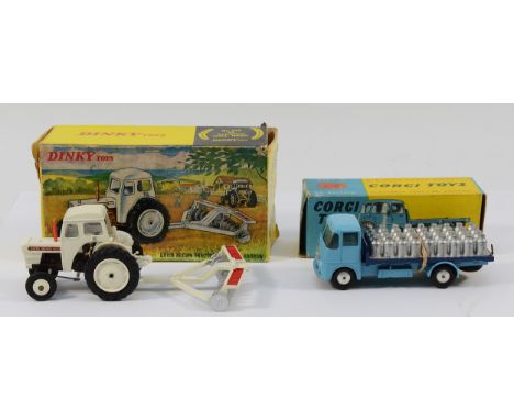 Corgi Toys; A boxed E.R.F model 44G platform lorry 457, together with a Dinky Toys David Brown tractor with disc harrow No.32