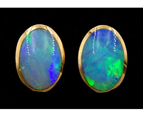 Pair of 9ct gold oval opal stud earrings, stamped 375Condition Report:Approx 3.65gm, head = 13mm x 9.5mm x depth = 5.3mm, goo