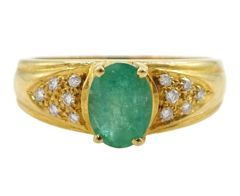 18ct gold single stone oval emerald ring, with diamond set shoulders, hallmarkedCondition Report:Approx 3.65gm, size K, max d