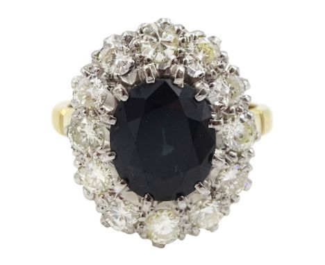 18ct gold and platinum oval sapphire and round brilliant cut diamond cluster ring, stamped, sapphire approx 2.80 carat, total