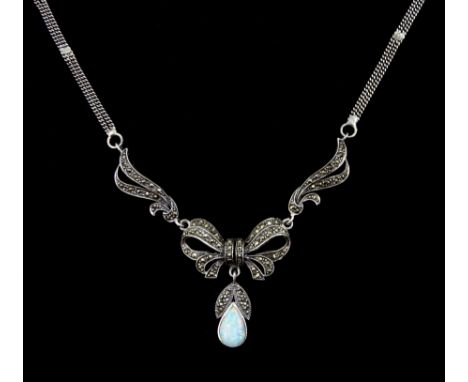 Silver pear shaped opal and marcasite bow design necklace, stamped 925 Condition Report:Pendant length = 3cm, chain length = 