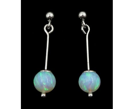 Pair of silver single stone opal pendant stud earrings, stamped 925 Condition Report:Length = 23mm, good condition 