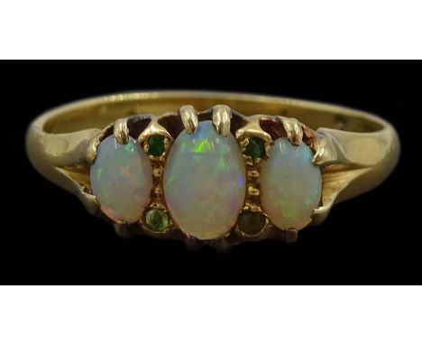 Early 20th century 18ct gold three stone opal and green stone set ringCondition Report:Approx 2.5gm, size P, tested 18ct, gre