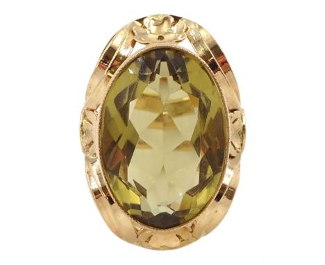 14ct rose gold large single stone oval citrine ring, in pierced flowerhead setting, Polish hallmarksCondition Report:Approx 9