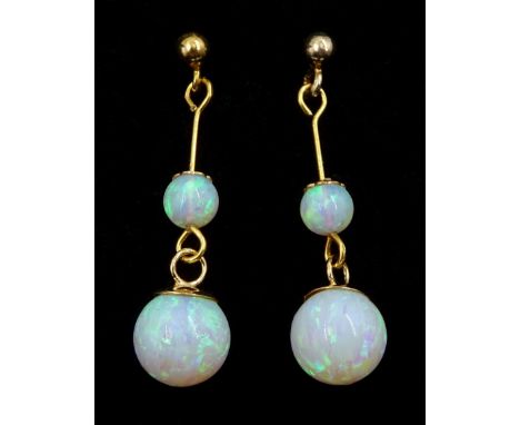 Pair of silver-gilt two stone opal pendant stud earringsCondition Report:Length = 28mm, test silver, good condition 