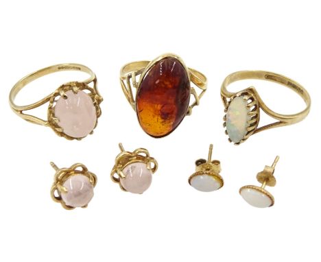 Gold opal ring, with similar pair of earrings, gold rose quartz ring, with matching pair of gold earrings and a single stone 