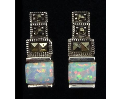Pair of silver rectangular opal and marcasite stud earringsCondition Report:Length = 16mm, test as silver, good condition