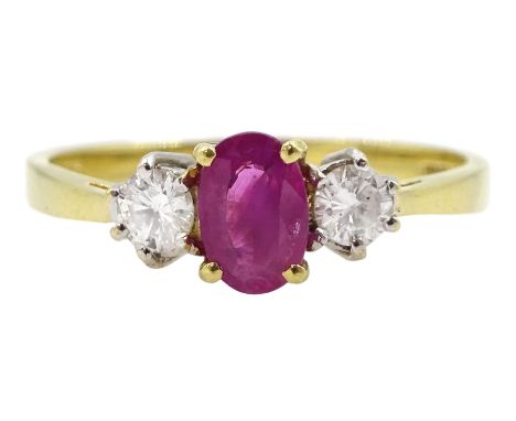 18ct gold three stone oval ruby and round brilliant cut diamond ring, London import mark 1998, total diamond weight approx 0.