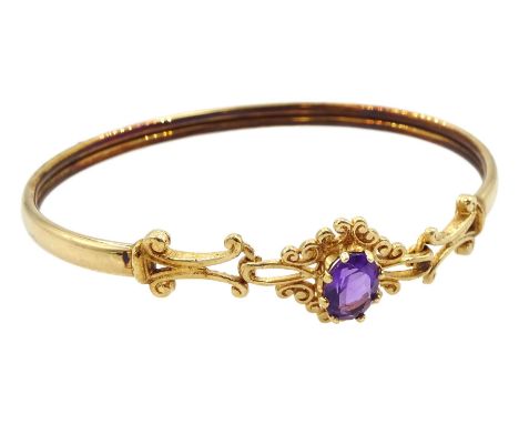 9ct gold single stone oval amethyst bangle, hallmarkedCondition Report:Approx 6.5gm, inner circumference = 16.5cm, good condi