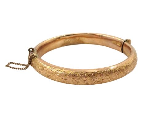 Edwardian 9ct rose gold hinged bangle, with bright cut decoration, Chester 1908Condition Report:Approx 11.55gm, hollow interi