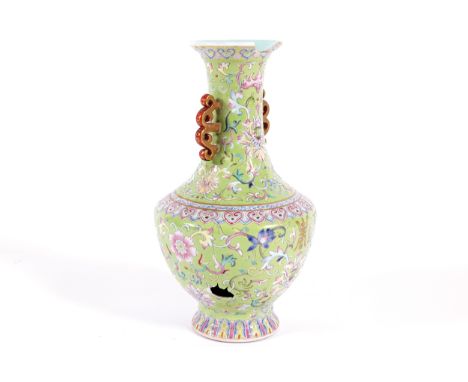 CHINESE QING PERIOD POLYCHROMEVASE of baluster form, Qianlong seal mark to base20 cm. high 