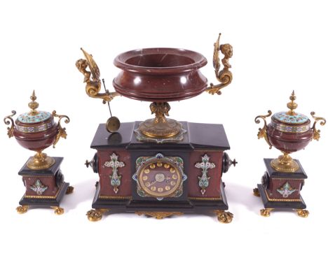 NINETEENTH-CENTURY MARBLE AND CHAMPLEVE ENAMELLED CLOCK GARNITURE Clock and two urnsClock: 40 cm. high; Urns: 30 cm. high