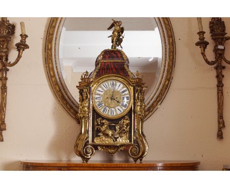 NINETEENTH-CENTURY ORMOLU MOUNTED TORTOISE SHELL CASED BRACKET CLOCK93 x 46 cm.