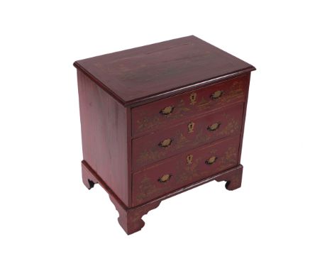 EIGHTEENTH-CENTURY PERIOD RED LACQUERED LOW BOYof two drawers, furnished with armorial brass handles, raised on bracket feet6