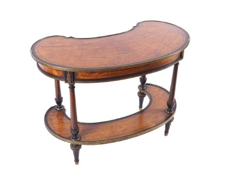 NINETEENTH-CENTURY BRASS MOUNTED SATINWOOD AND EBONY CROSS BANDED LADIES WRITING DESK the kidney shaped top above a conformin